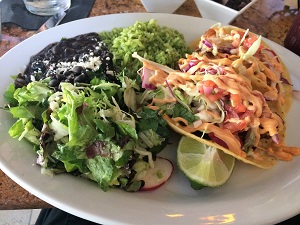 Zócalo Midtown signature dishes GuacamoleEnchiladas en MoleBaja Fish Tacos